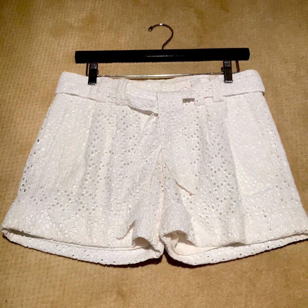 White eyelet express shorts